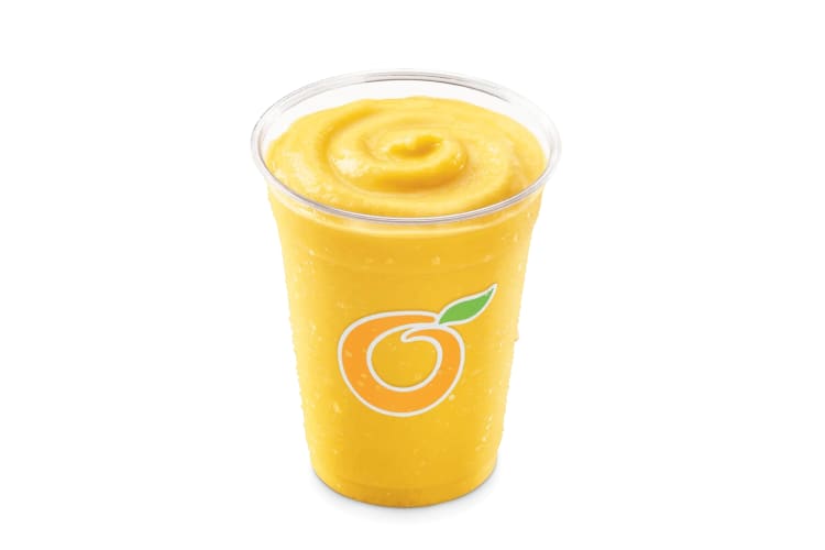 Mango smoothie served on a DQ cup