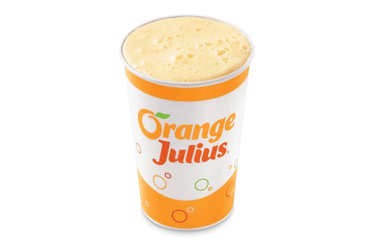 Orange juice served on a to-go cup