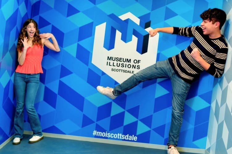 Playing at the Museum of Illusion is a fun date idea in Scottsdale.