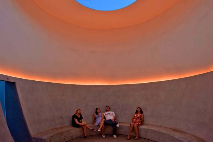 People enjoying the skyspace at Scottsdale museum.