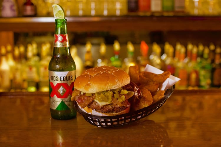 Enjoying a burger at the Rusty Spur Saloon is a great date idea in Scottsdale.