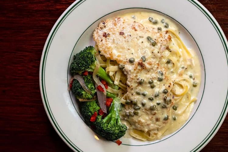 A plate of food from Huber’s Café, a great place for a date idea in Portland
