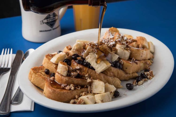 Try the Kamikaze French toast topped with maple syrup
