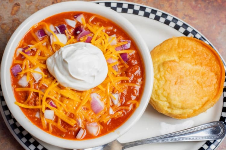 Homemade chili toppes with onions