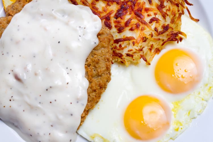 Country-fried steak served with hash brown