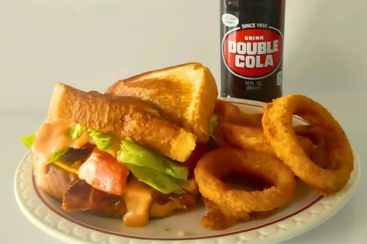 Vintage Melt, with crispy onion rings and double cola