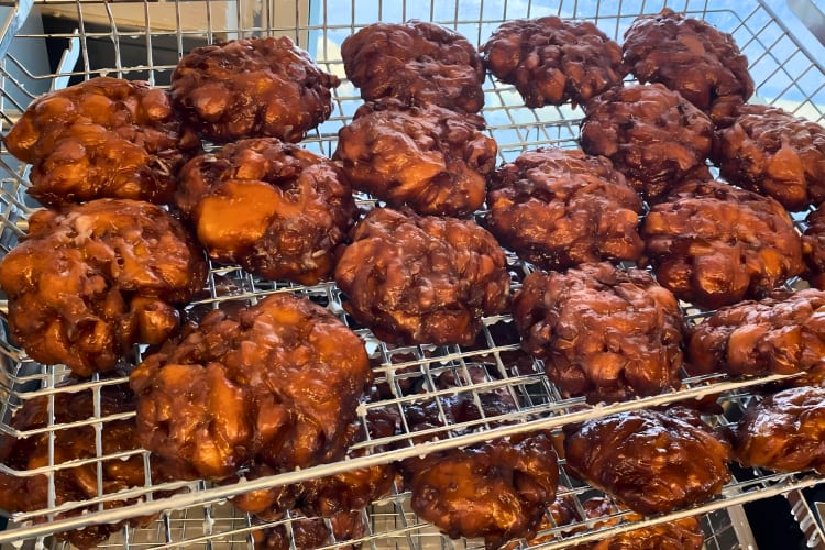 Apple fritters display on racks