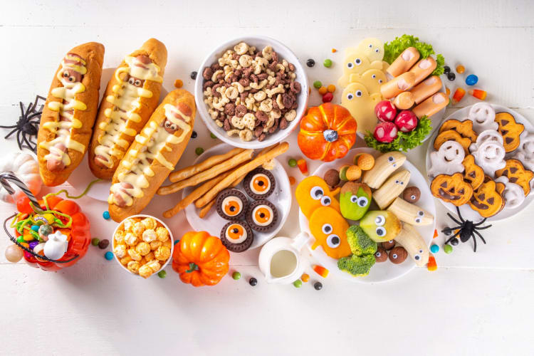 For this themed dinner party bring out the Halloween decorations and sweets.