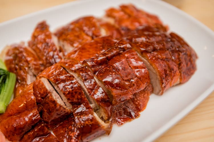 sliced Chinese roasted duck on a plate