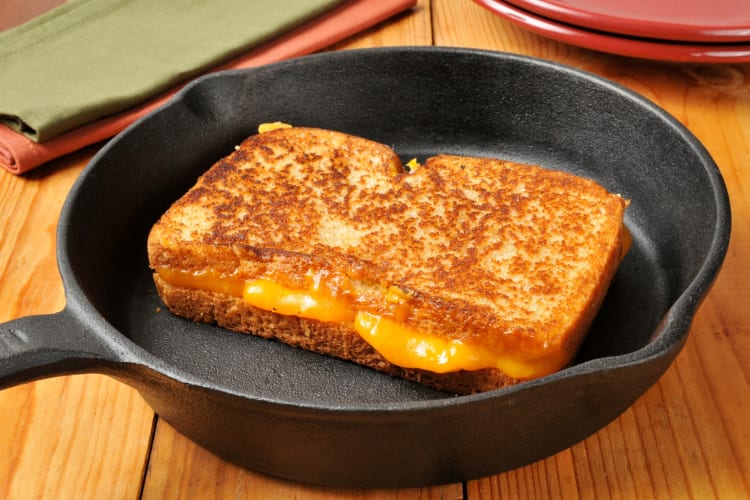 Grilled cheese served on a iron skillet