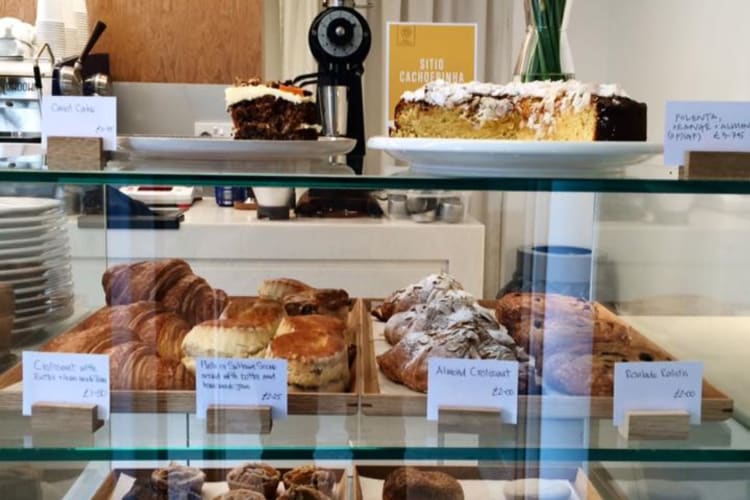 Freshly baked pastries in a display window being served in Edinburgh for breakfast