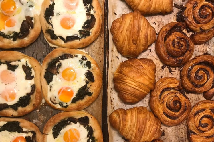 Freshly baked pastries on a baking tray