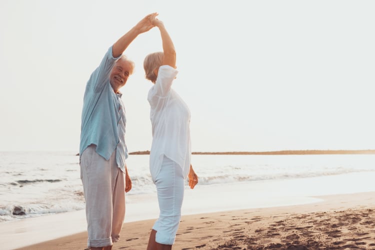 Couple dancing at the beach