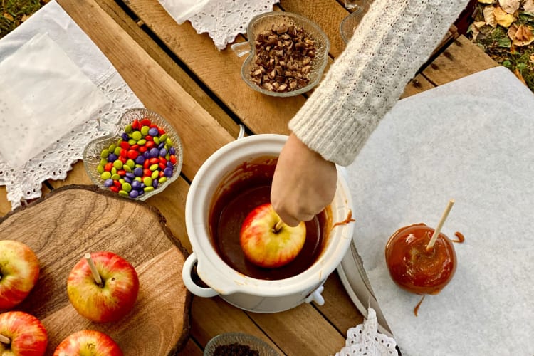 Caramel apple making.