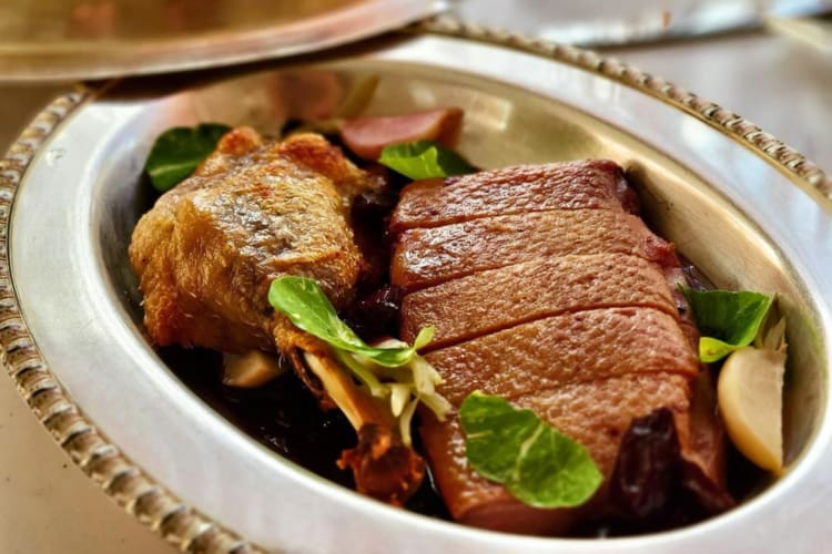 Duck breast topped with greens
