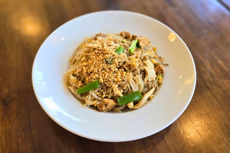 Classic pad Thai topped with peanuts