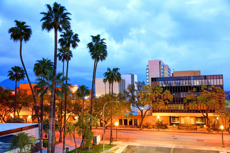 An area with buildings and trees in San Bernardino — the county where the original McDonald's opened