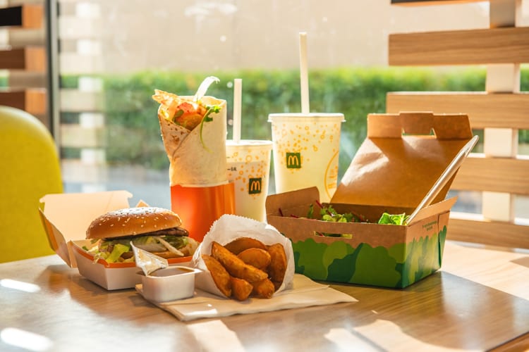An assortment of McDonald's food and drinks on a table