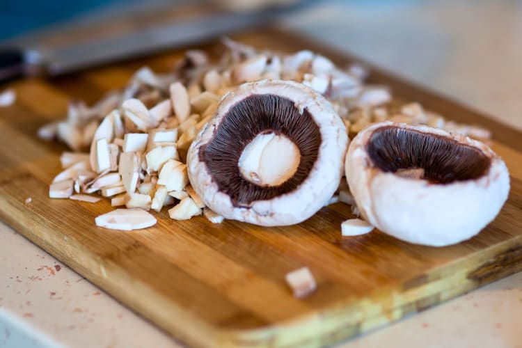 Mushrooms on a chopping board.