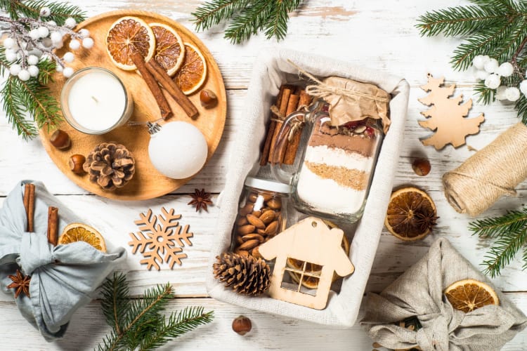 Christmas gift box with food flatlay. 