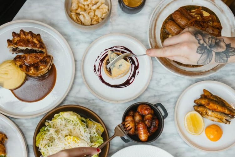 A spread of food on a restaurant table.