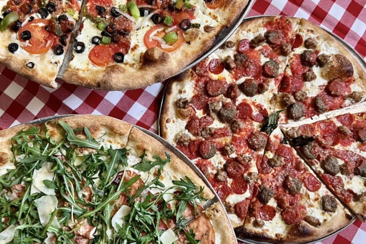 Three pizzas from Grimaldi’s Pizzeria, a gluten-free restaurant in Las Vegas