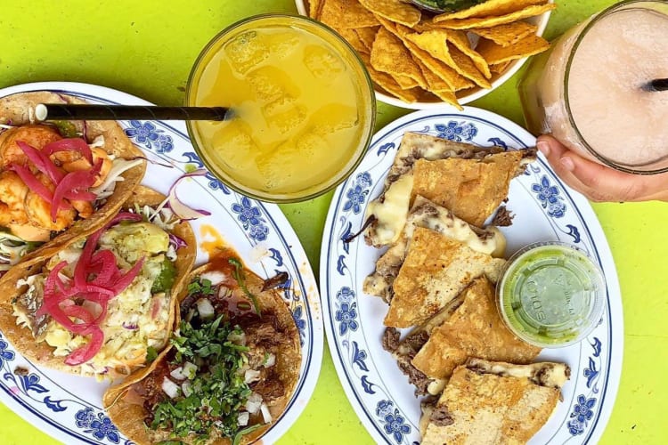 Tacos, drinks and chips from La Esquina in NYC