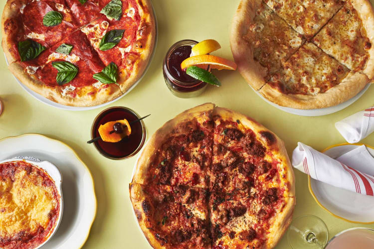 Three pizzas and a bowl of baked mac and cheese from Nizza