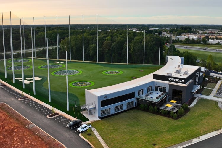 A Topgolf course and building