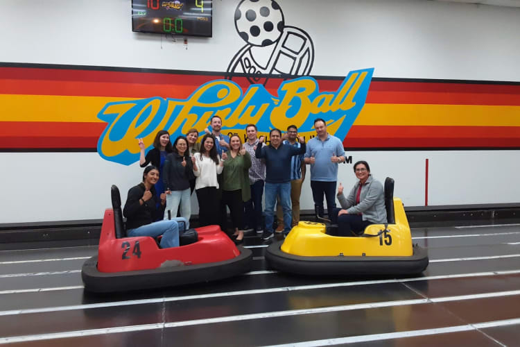 people in go-karts playing Whirlyball