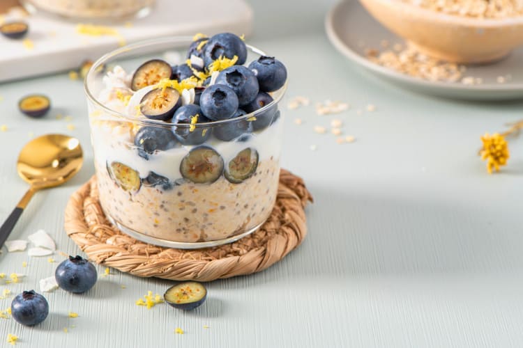 Healthy blueberry lemon overnight oats topped with blueberries.