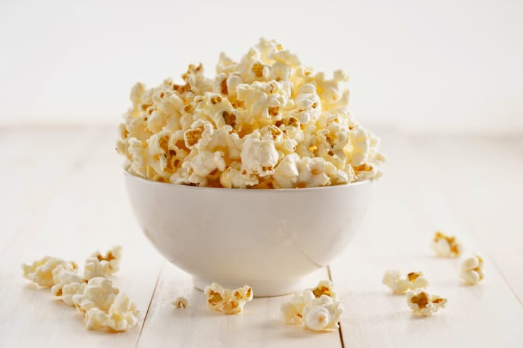 Popcorn in a white bowl.