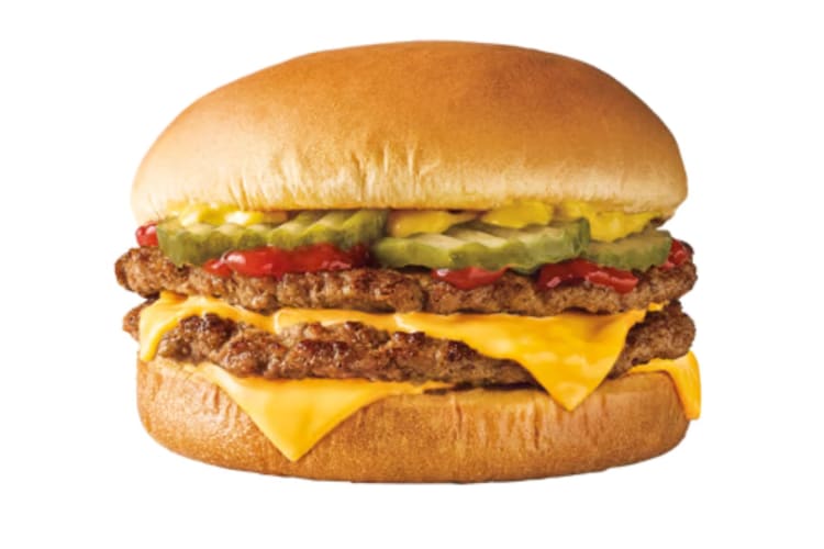 two juicy, 100% pure beef, seasoned patties layered with two slices of melty American cheese, pickles, ketchup, and mustard on a golden, toasted bun.