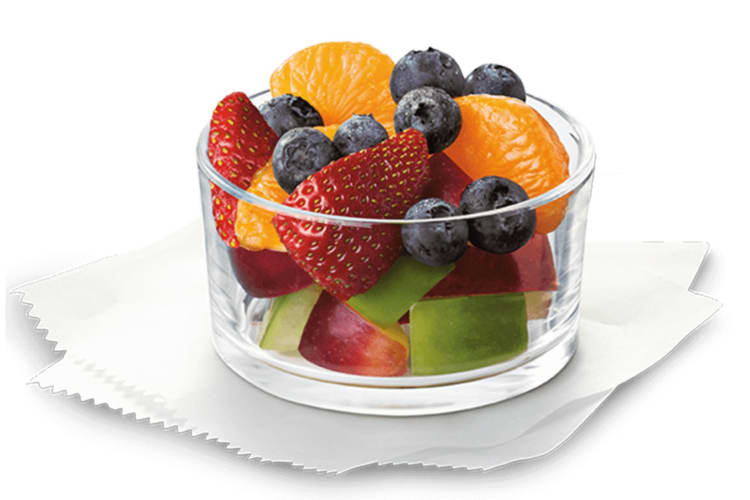 A nutritious fruit mix made with chopped pieces of red and green apples, mandarin orange segments, fresh strawberry slices, and blueberries, served chilled.