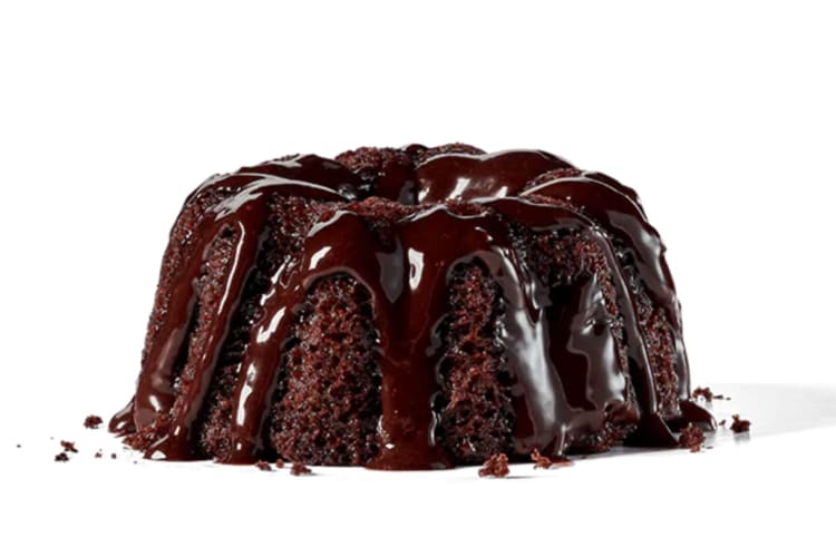 Rich chocolate cake made with cocoa, bittersweet chocolate chips and drizzled with chocolate buttercream icing. 