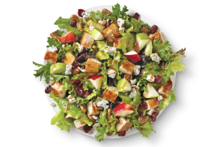 Made fresh daily with Wendy’s signature lettuce blend, crisp red and green apples, dried cranberries, roasted pecans, crumbled blue cheese, and grilled chicken, all topped with a Pomegranate Vinaigrette dressing.