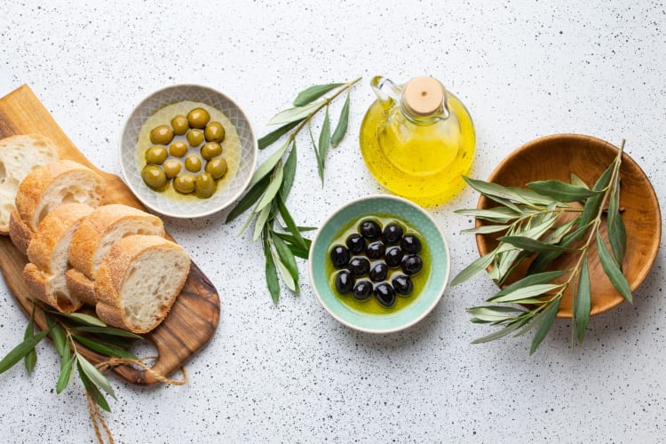 Olives with olive oil and bread.