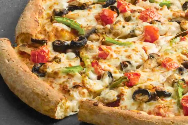 Loaded with crisp green peppers, fresh-cut onions, mushrooms, ripe black olives, vine-ripened Roma tomatoes, and real cheese made from mozzarella.