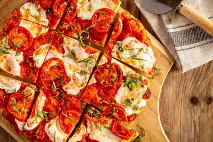 Fresh mozzarella and basil with a housemade pizza sauce.