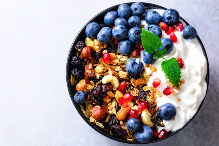 healthy greek yogurt, berries and granola canva