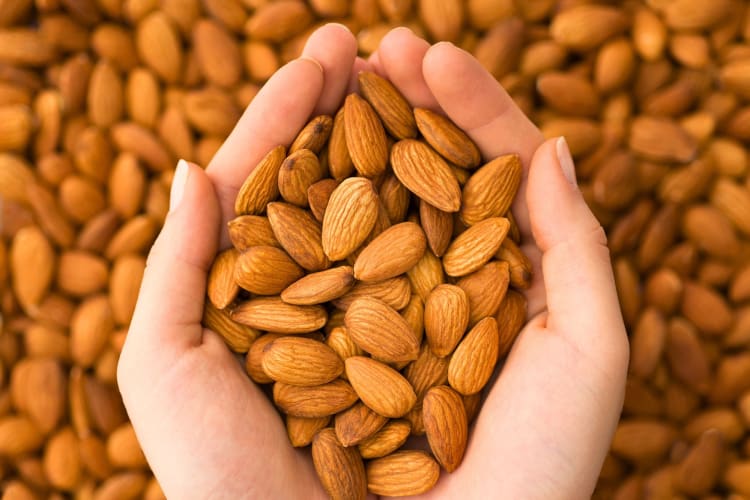 Plain or flavored almonds are healthy snacks packed with protein, fiber and healthy fats. 