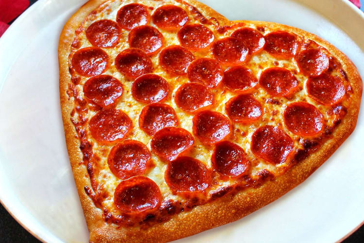 A heart-shaped pizza.