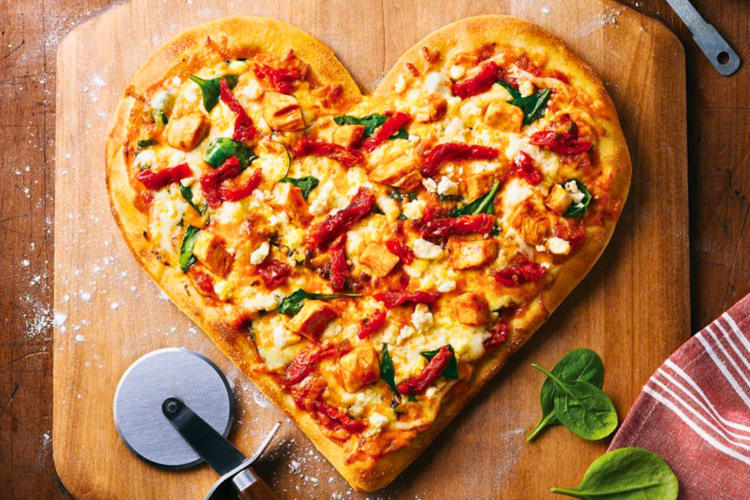 A heart-shape pizza.