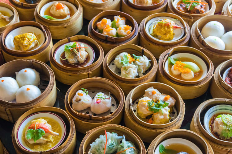 Various dim sum dishes in bamboo baskets — a popular Hong Kong food