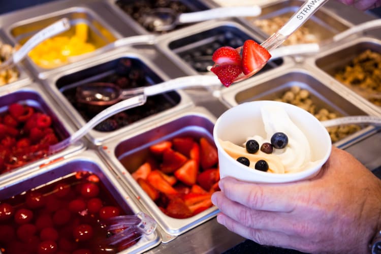 Frozen yogurt and healthy toppings.