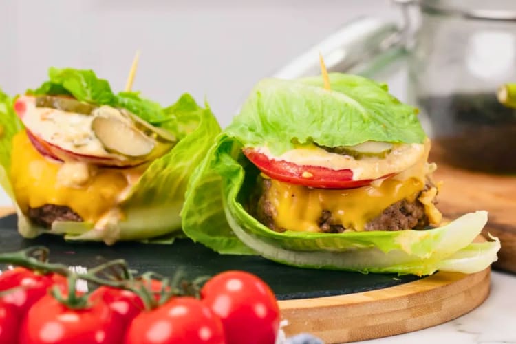 A burger wrapped in lettuce.