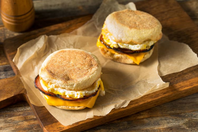 A low-carb fast food is a popular breakfast choice, consists of an English muffin, egg, Canadian bacon and cheese.