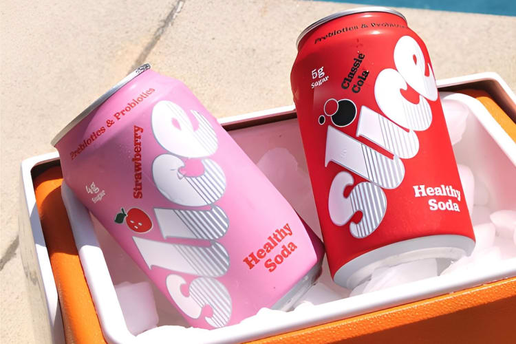 Two sodas in a cooler.