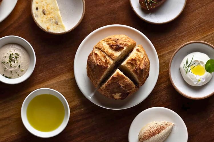 House-made sourdough with a selection of spreads