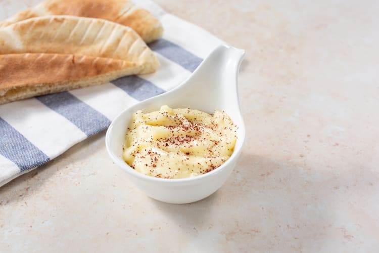 Toum is a delicious Middle Eastern food that's used as a spread on breads